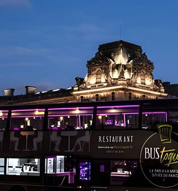Dîner en bus Toque avec champagne depuis les Champs-Élysées
